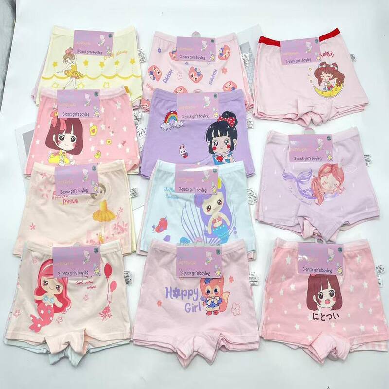 ots-shortys-boyleg-coton-fille-douzaine Neuf lots de trois shortys de type boyleg pour fille aux couleurs pastel avec des imprimés mignons (sirènes, personnages).
